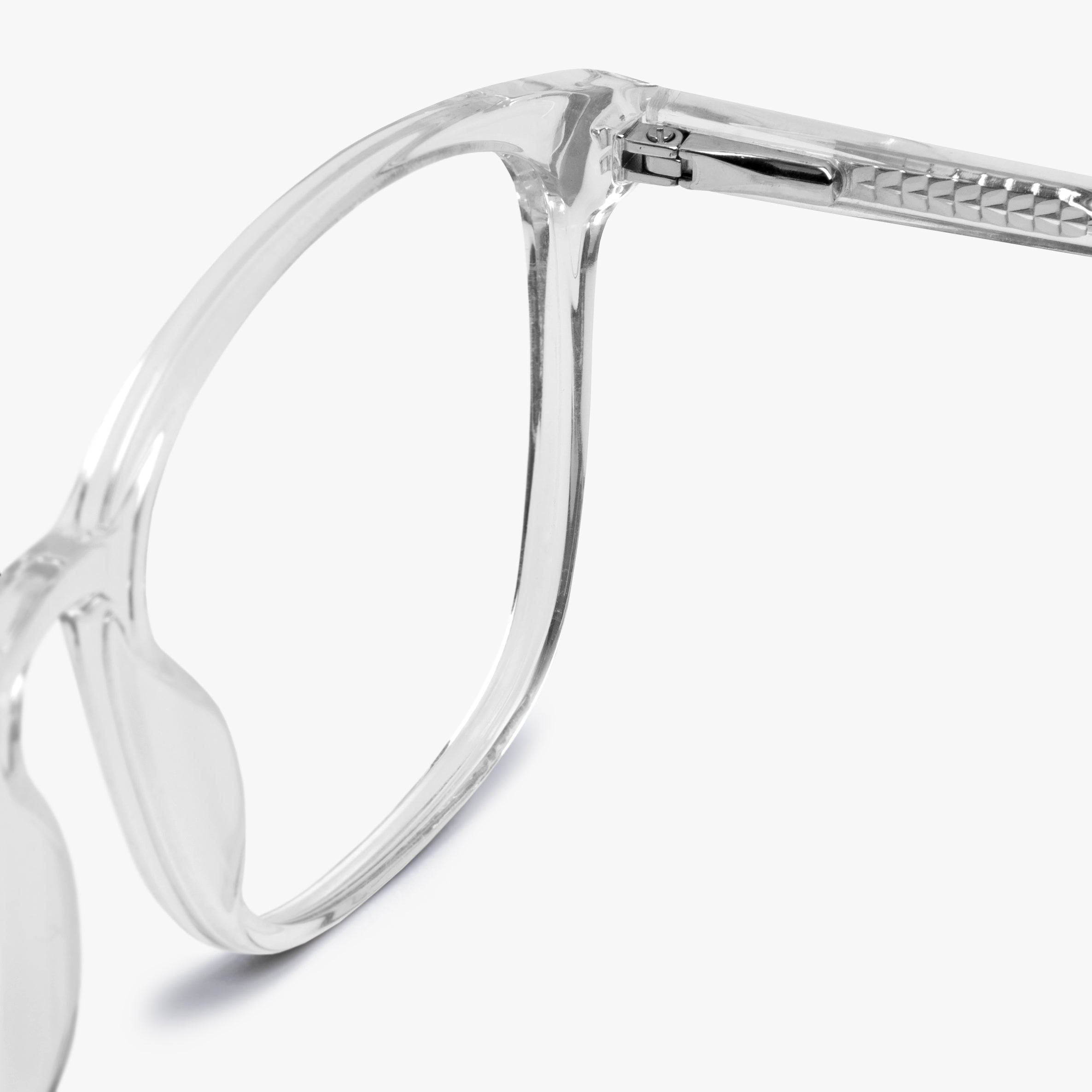 Close-up of Ebeltoft Crystal White reading glasses with clear frame