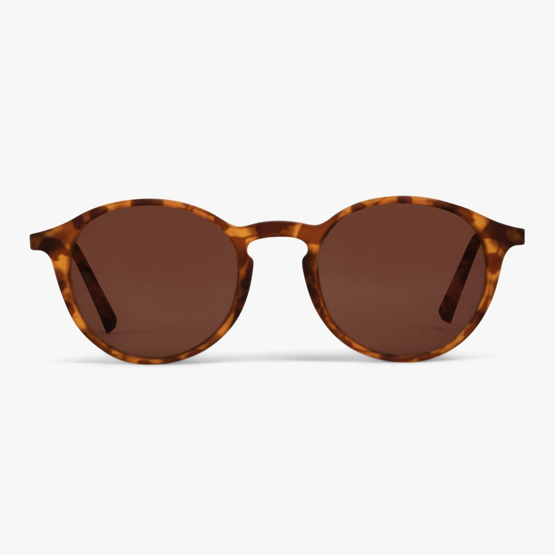 Round brown tortoiseshell sunglasses with dark lenses