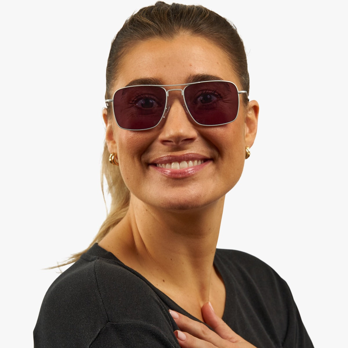 Person wearing Lidköping Steel sunglasses with rectangular dark lenses