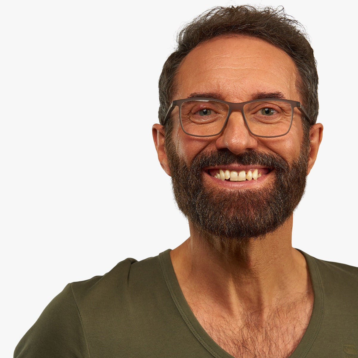 Person wearing men's grey rectangular glasses