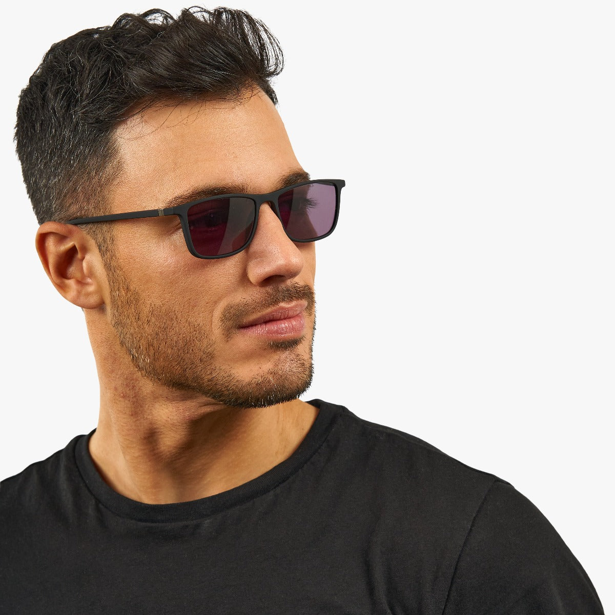 Person wearing Skagen black rectangular sunglasses