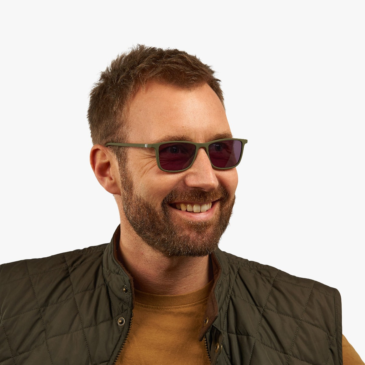 Person wearing Skagen Dark Army glasses with green frames