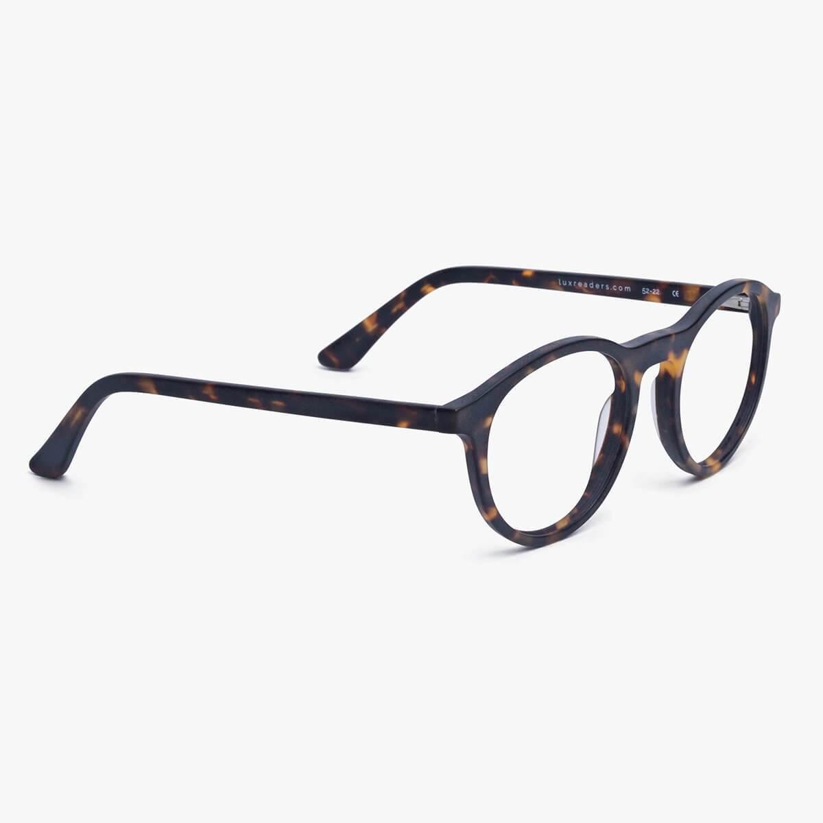 Dark turtle reading glasses with round frames and Luxreaders branding