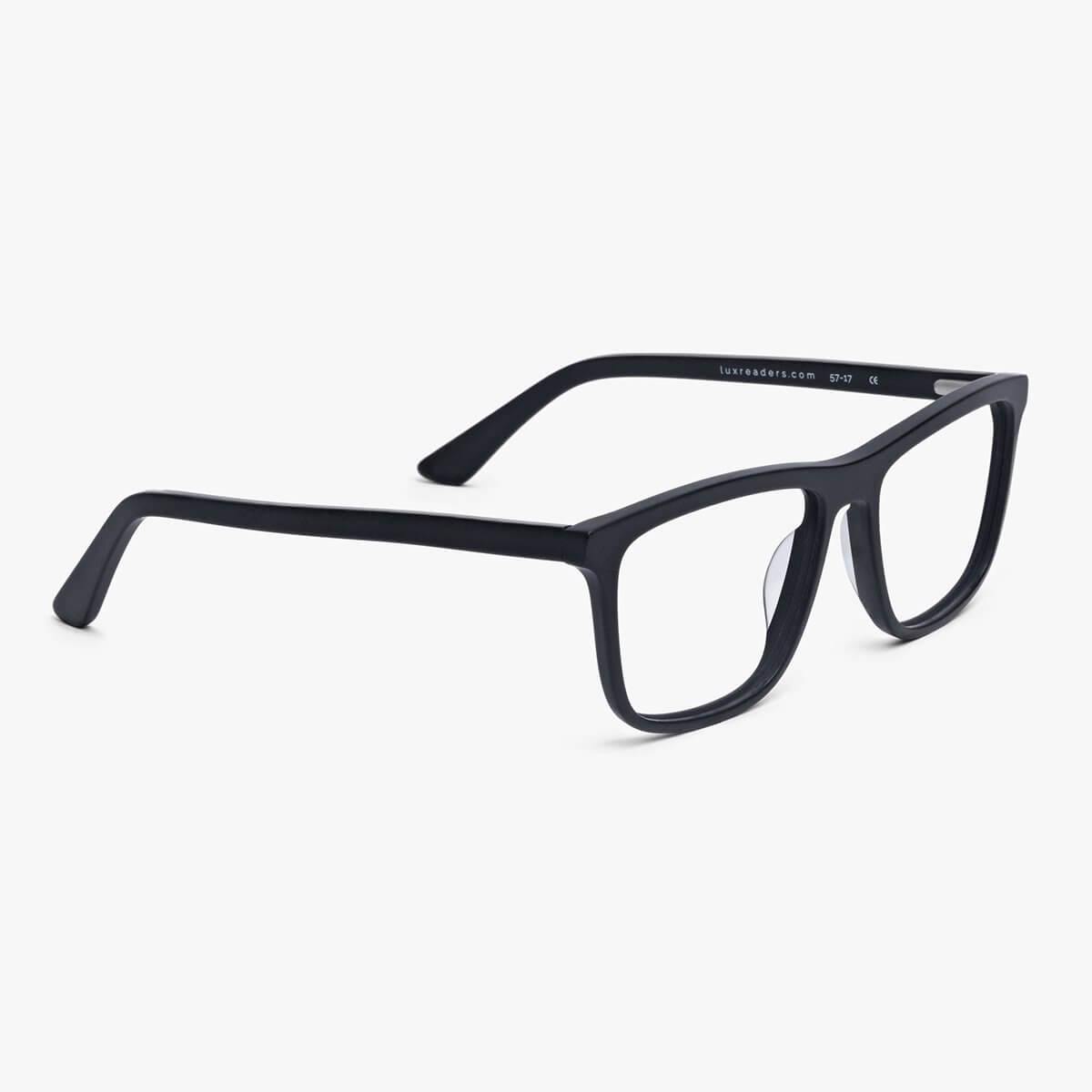 Black square reading glasses with text Luxreaders inside arm