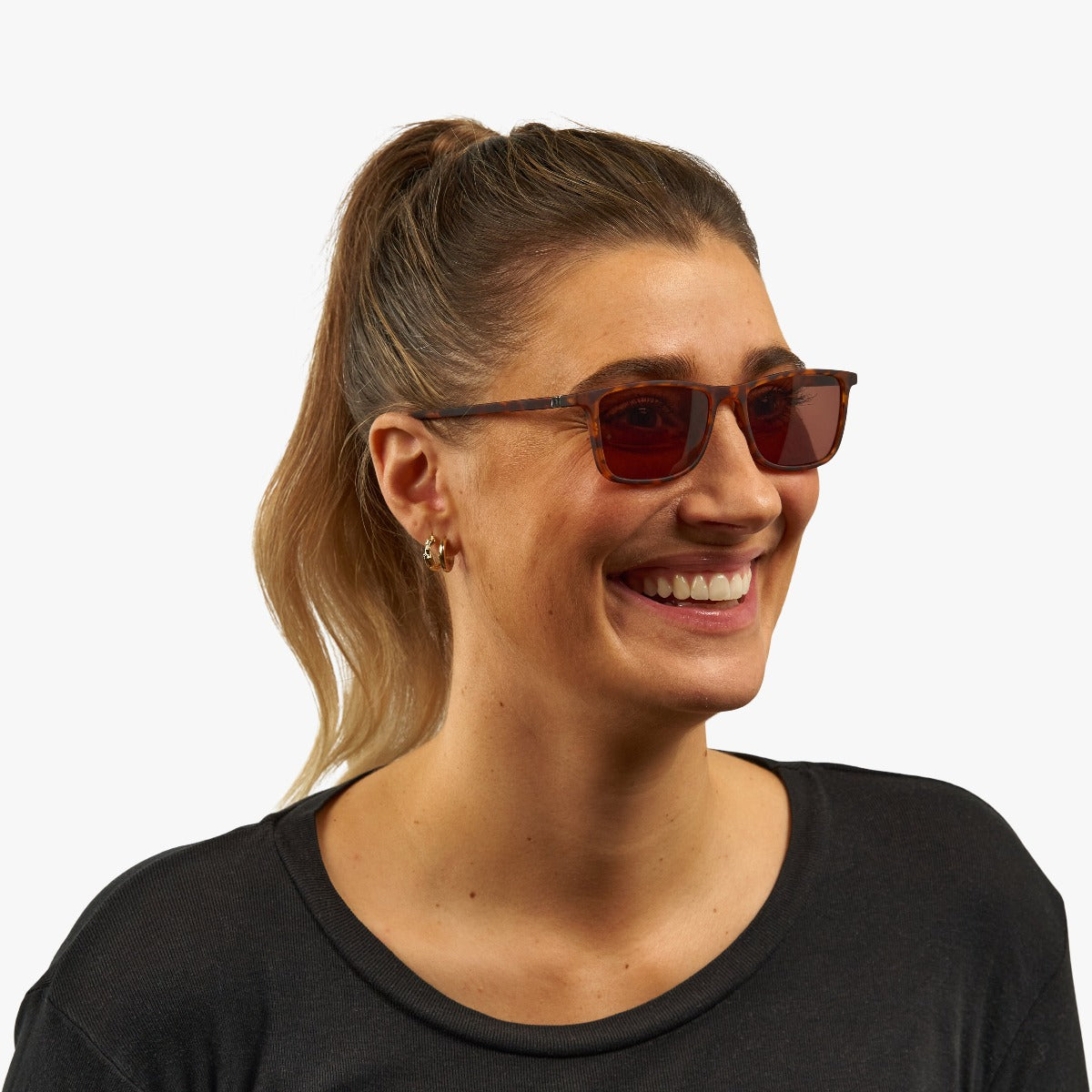 Person wearing Skagen Turtle glasses with brown frames
